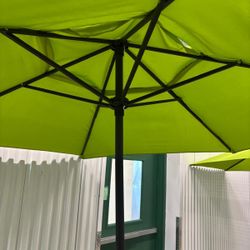 Two XL UV Ray protected patio umbrellas, 8 feet high , 8 feet round … $75 EACH