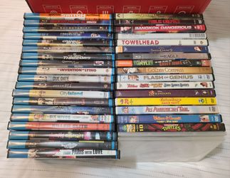 Box of 37 DVDs and Blu-ray movies