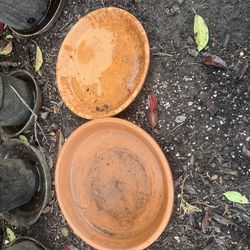 Set of terracotta saucers 10-12”