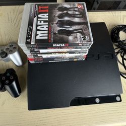 PS3 With Two Controllers And Games