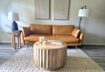 Ishan Round Driftwood Ridged Coffee Table from World Market