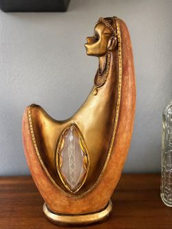 Unique golden figure statue