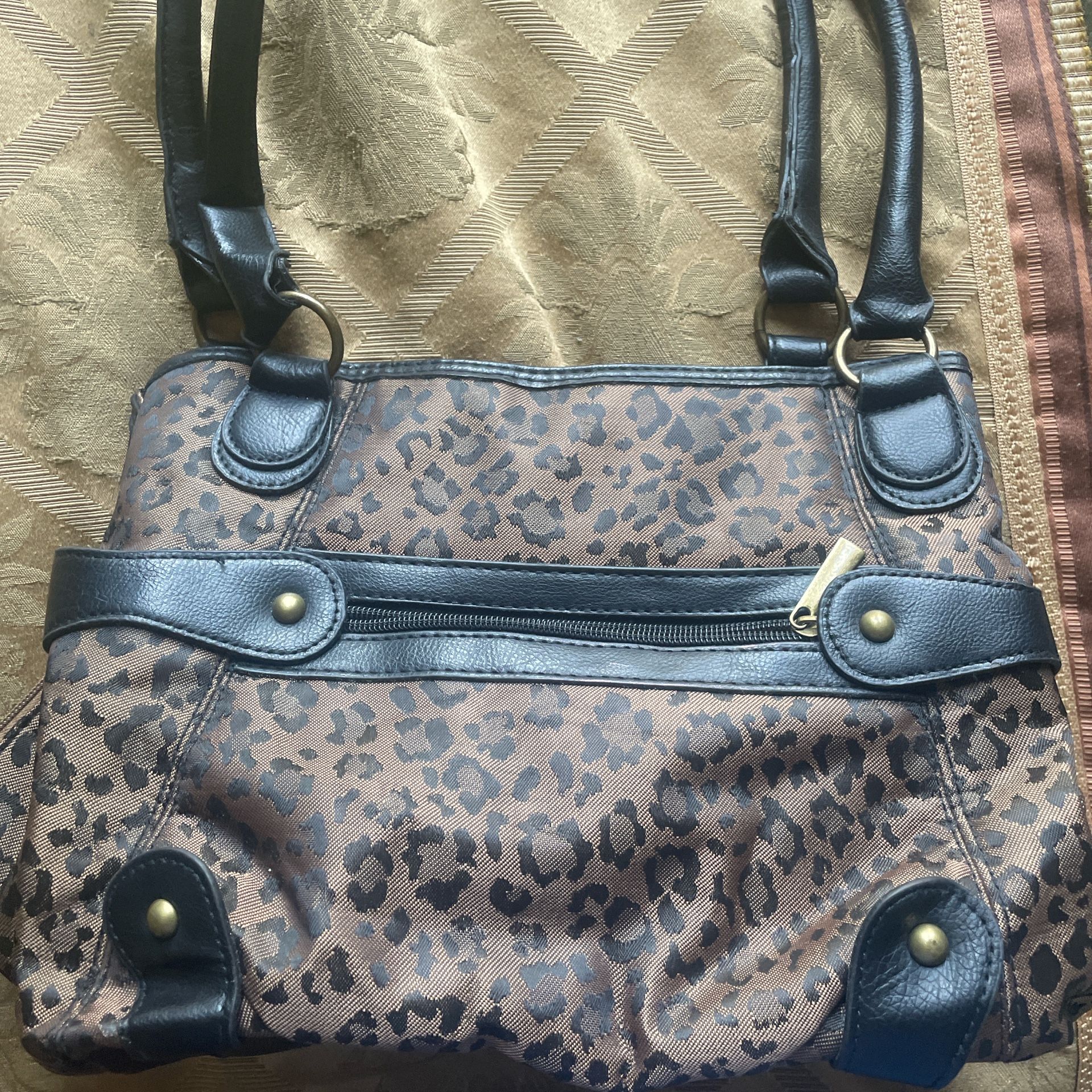 Cheetah Print Bag With Gold Embellishment