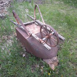 Antique Iron Wheelbarrow