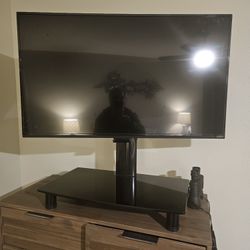 T V