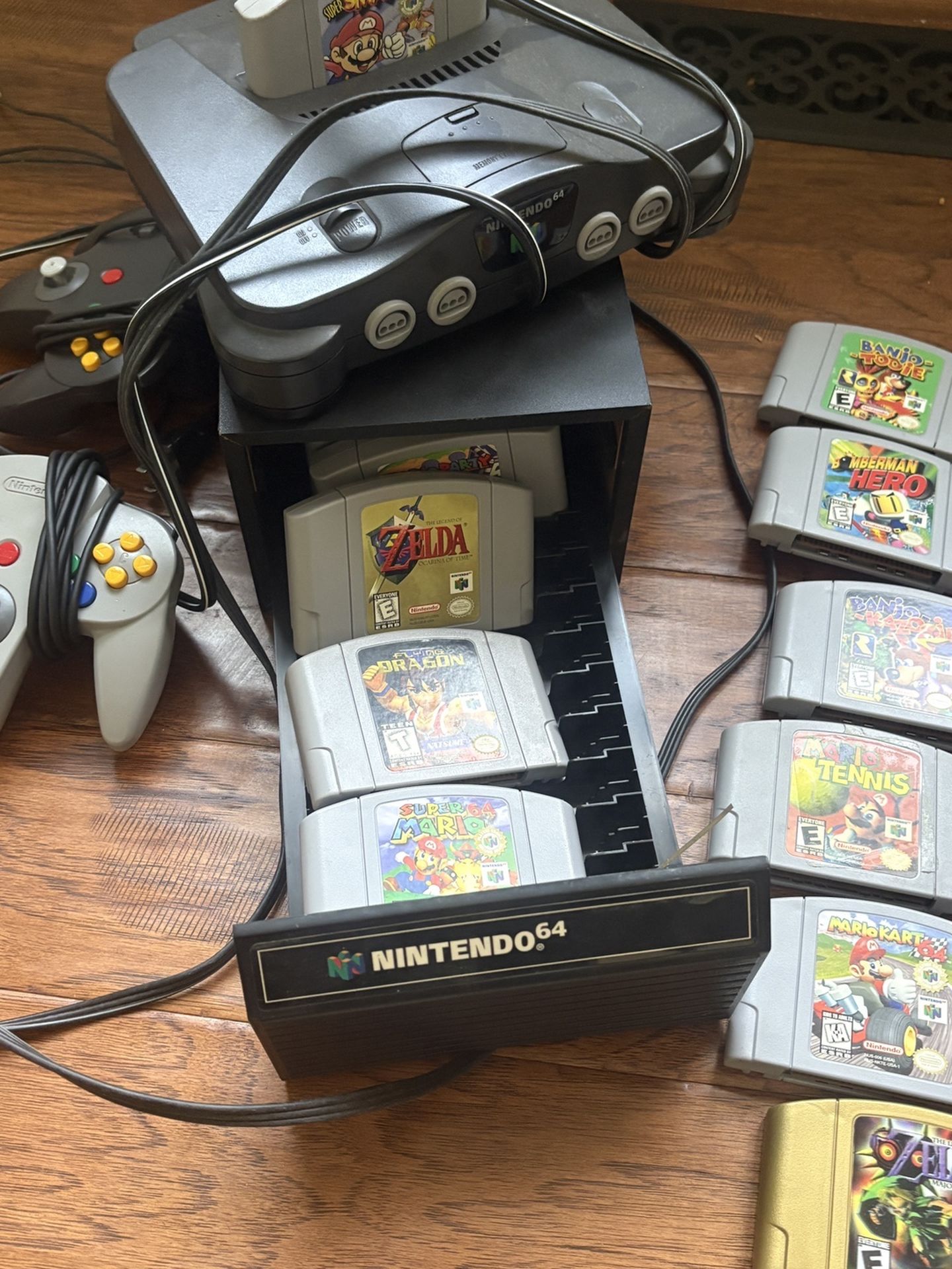 Nintendo 64 with  Super Smash Bros, Super Mario 64, Zelda Ocarina of Time, Zelda Windwaker and 2 Controllers