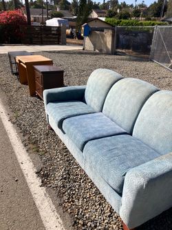 Blue sofa with throw pillows