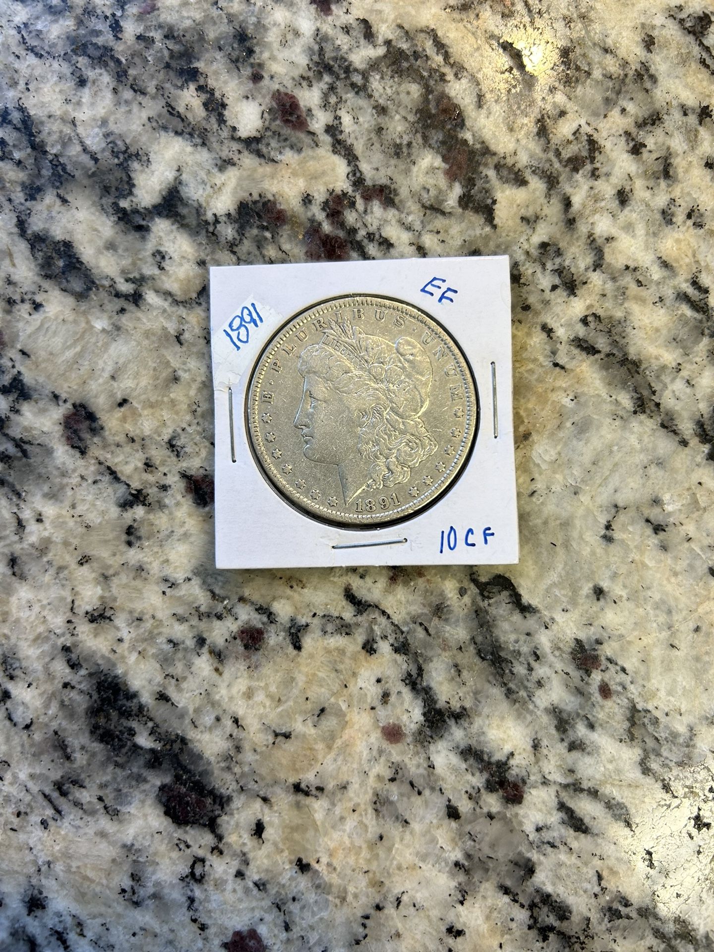 1891 Morgan, Silver Dollar. (10cf)