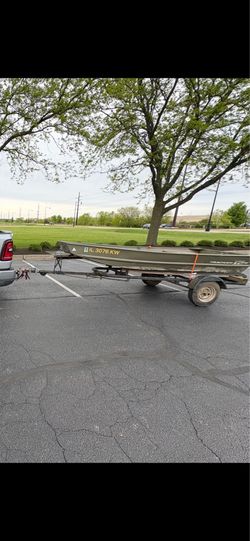 Tracker 12ft W John boat and trailer