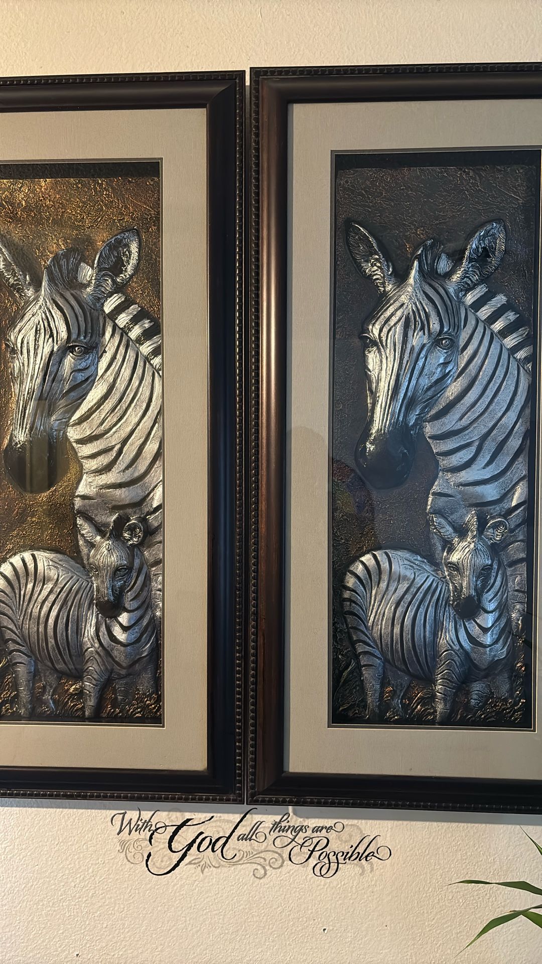 Two tall zebra pictures