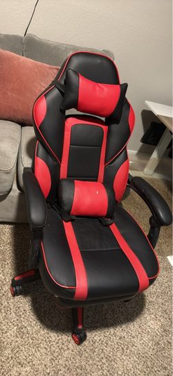 Red and Black Gaming Chair with Footrest missing 1 wheel