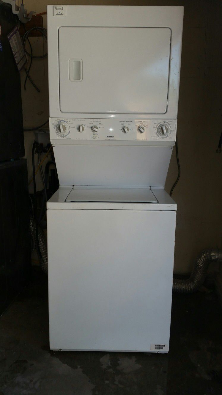 beautiful Kenmore laundry Center stackable washer and gas dryer in excellent condition.