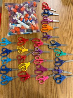25 scissors and gallon bag of gluesticks