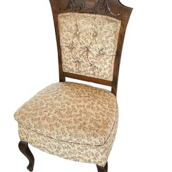 Antique Carved Wooden Chair with Ornate Floral Pattern Spring Seat Cushion