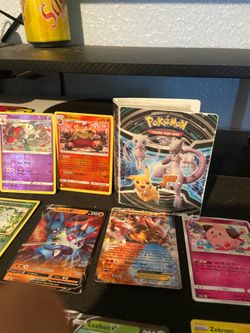 Pokémon book with Pokémon cards