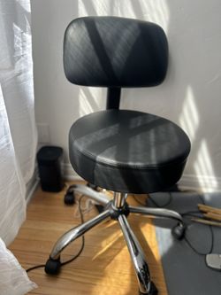 ADJUSTABLE LEATHER CHAIR