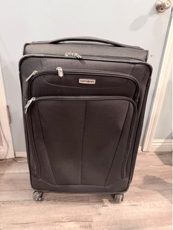 4 wheel samsonite luggage/black