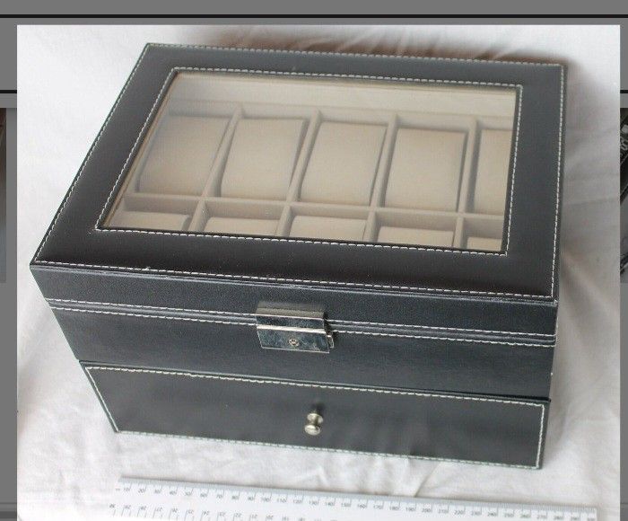 Elegant black leather 12 slot men's watch organizer. With jewelry display drawer lockable watch case