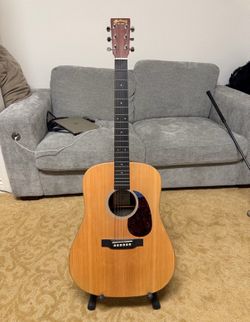 Martin X Series Special Acoustic/Electric Guitar and Wolfpack Guitar travel case and care package