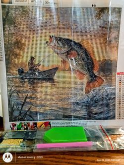 Man Fishing Big Mouth Bass Jumping