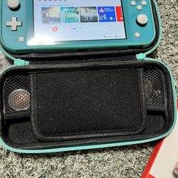 Switch lite with 3 Zelda games