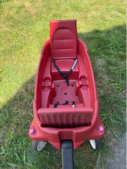 Red Radio Flyer with seat