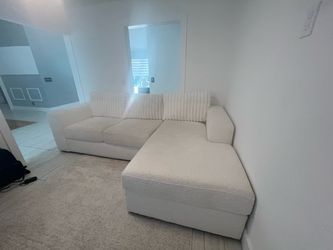 White couch with chaise