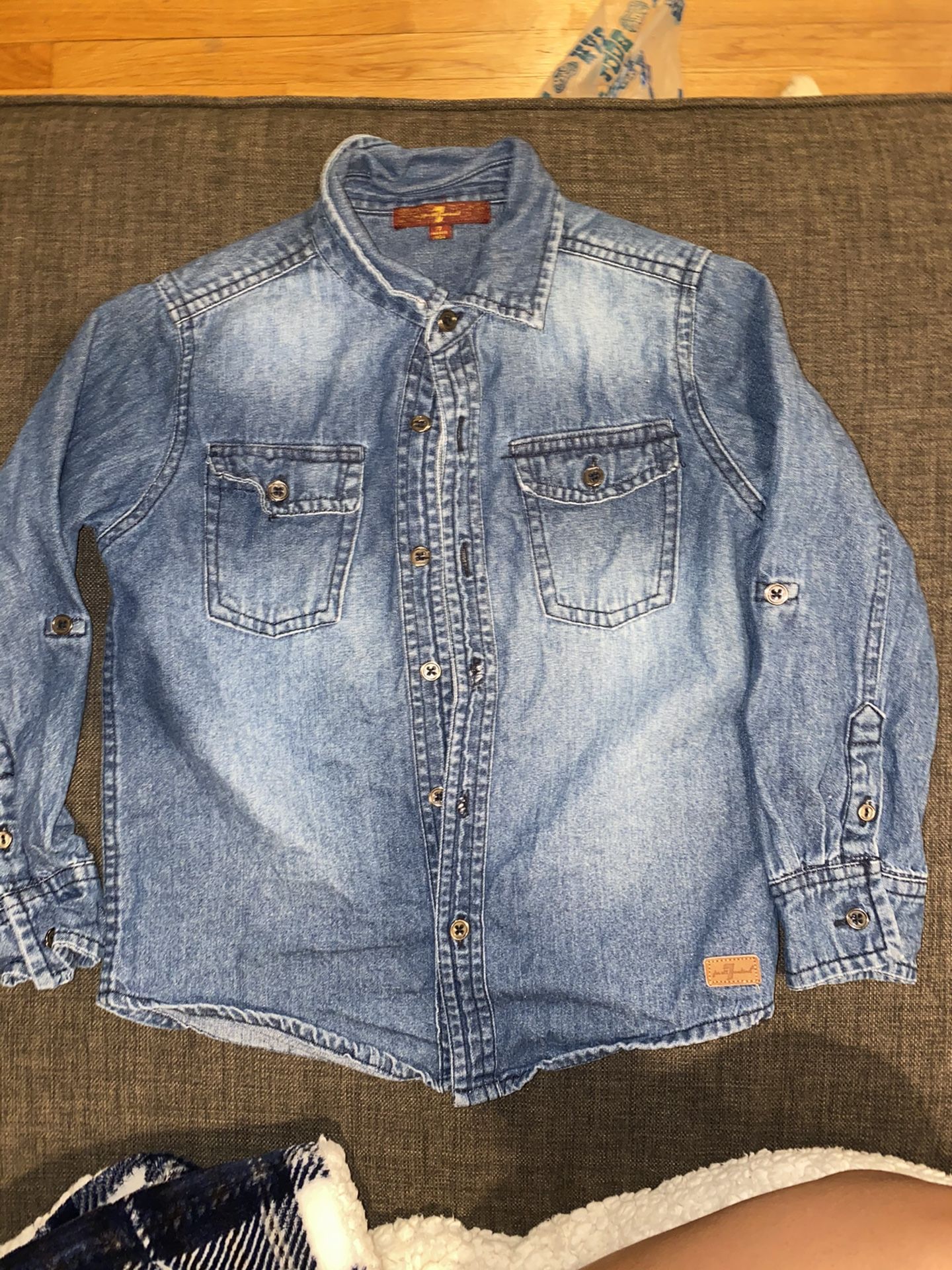 Two flannel tops size 7 and small, denim top size 7.