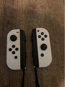White Nintendo Switch Joy Cons