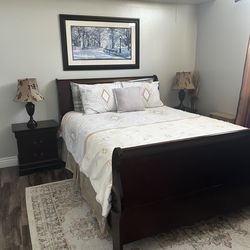 Queen bed frame with two night stand and two table lamp