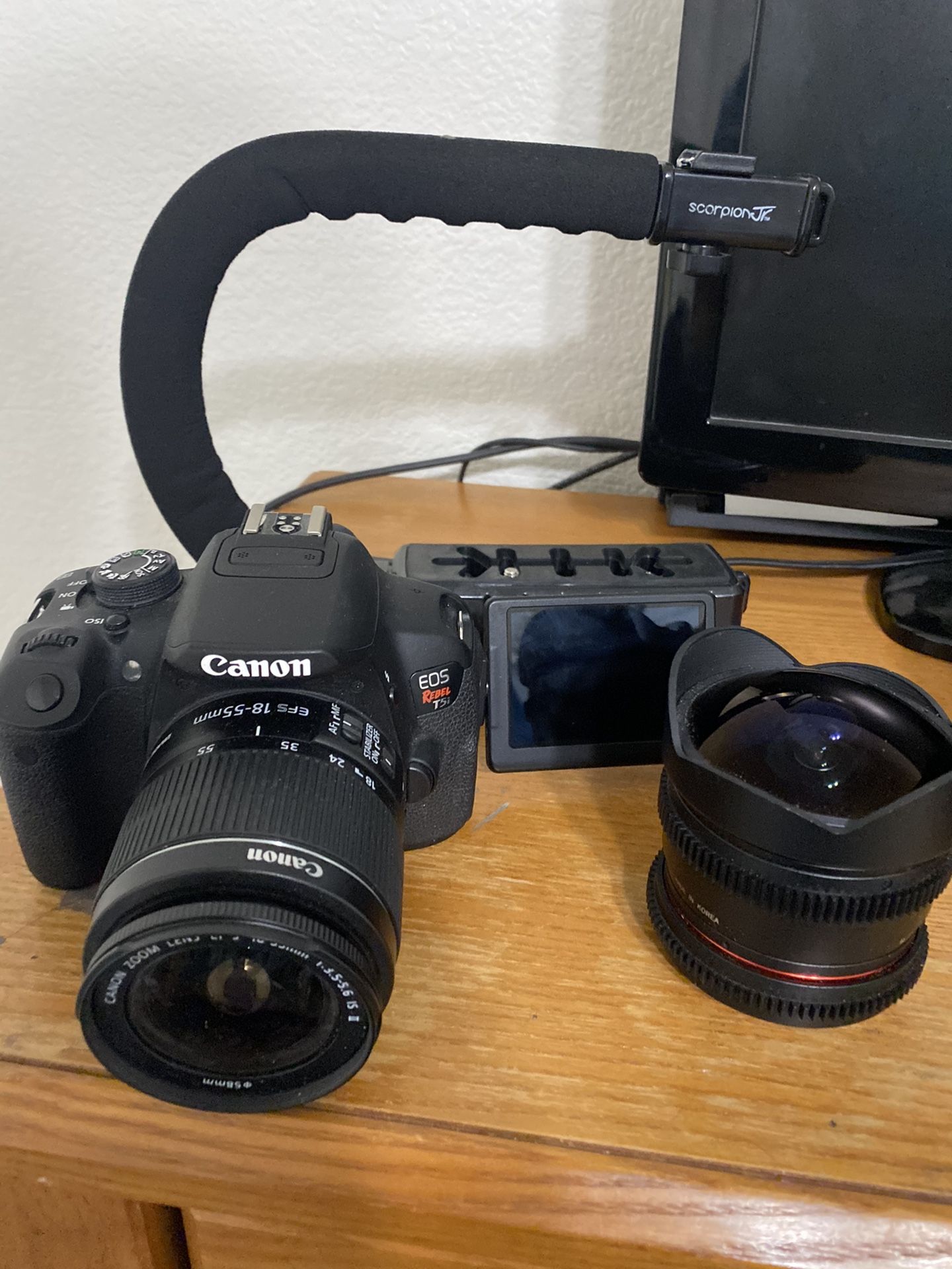 Canon EOS Rebel T5i DSLR w/ Rokonin Fisheye, camera bag, grip, batteries and chargers