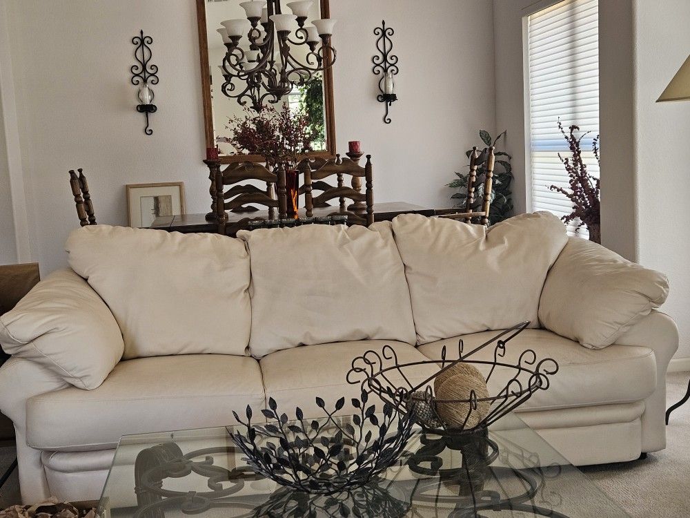 Set Of Two Leather Comfortable Cream Couches With Down Filled Pillows
