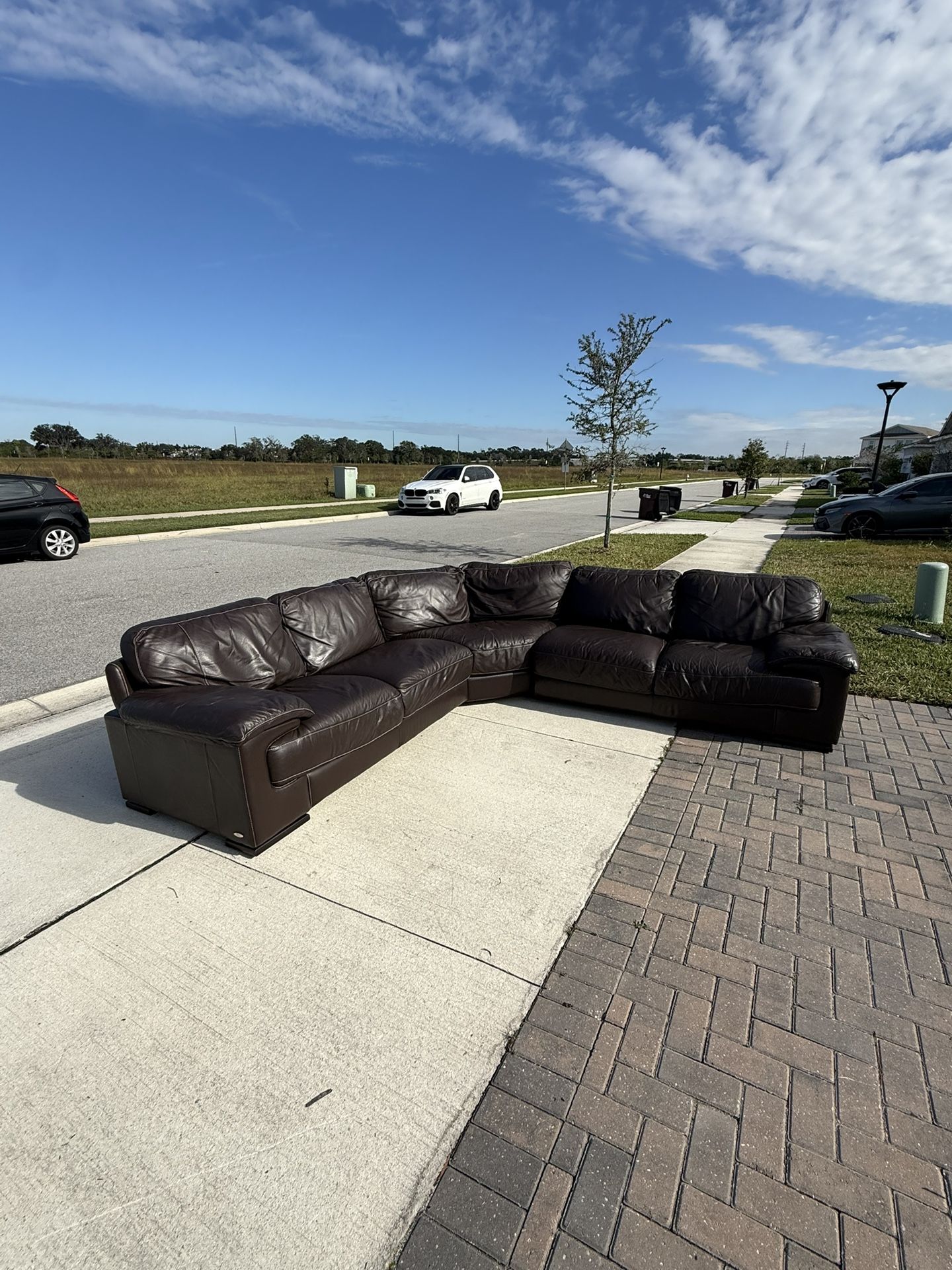 Free Delivery- Cindy Crawford Leather Sectional Couch