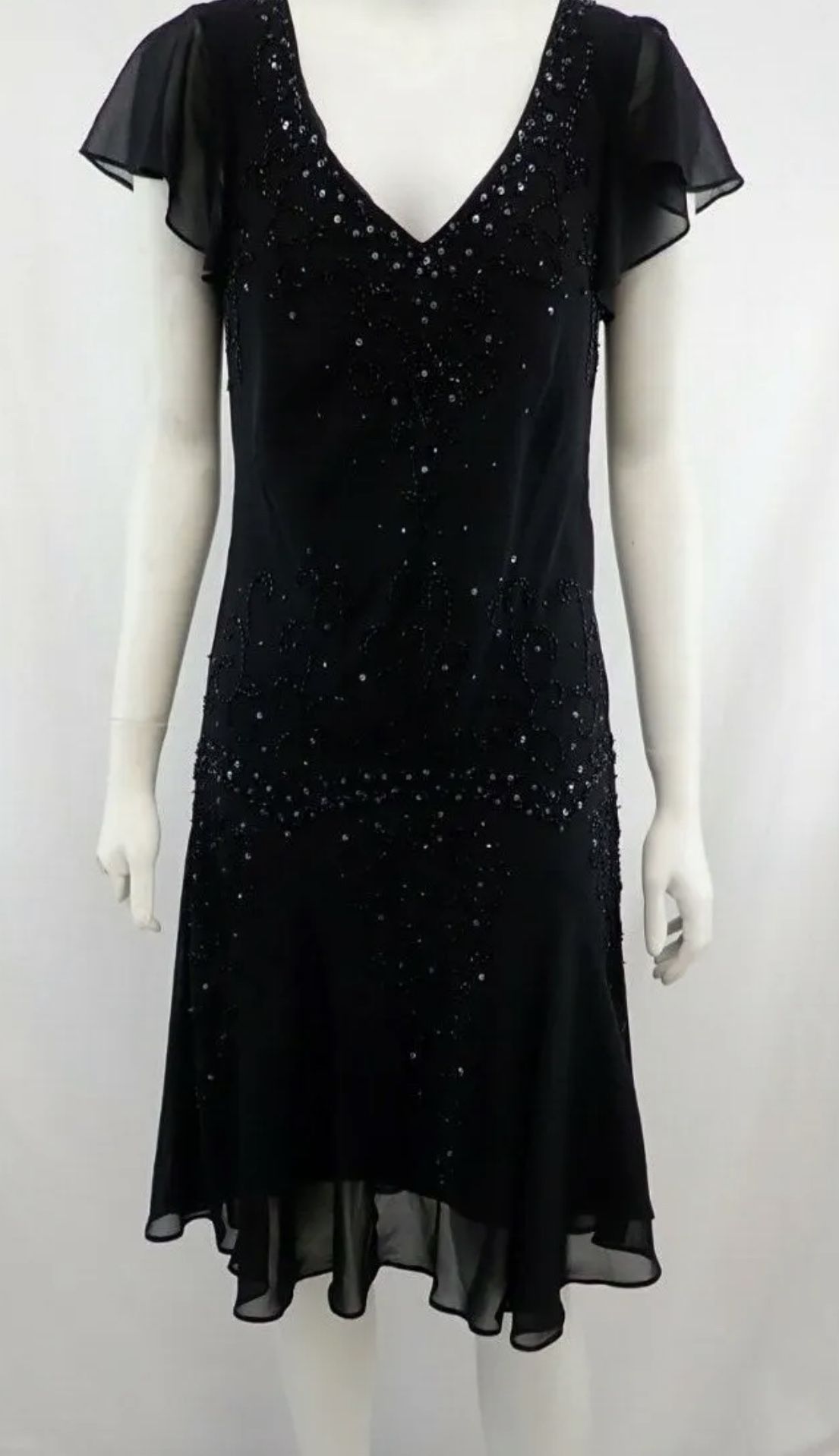 R & M Richards Dress NWOT 6P. Black with beautiful beading and sequins. It has flutter sleeves. The dress is a true black color like in the first 2 pi