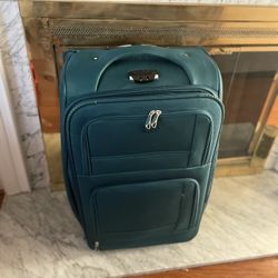 Sleek Teal Rolling Suitcase - Expandable, TSA-Lock, Travel-Ready