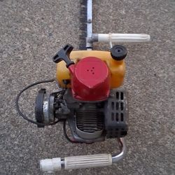 Gas powered hedge clippers.