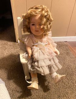 Porcelain Doll With Chair