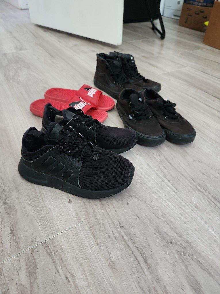 4 Pairs : Nike Size 4Y, Both Vans Size 3Y, Puma 4Y .