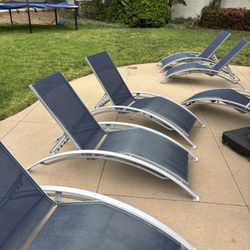 Six Outdoor Chairs