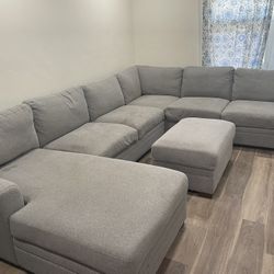 Grey Sectional Couch With Ottoman (storage)