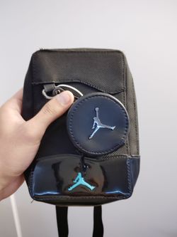 Black and blue Jordans bag