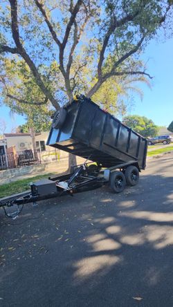 NEW DUMP TRAILERS 12x8x4 ROLLING TARP AND SPARE TIRE 2026 YEAR ELECTRIC BRAKES LIGHTS REMOTE CONTROL TITLE IN HAND READY FOR WORK,se habla ESPAÑOL