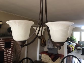 Opulent 5- tier polished brass chandelier