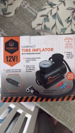 Compact tire inflator with pressure gauge