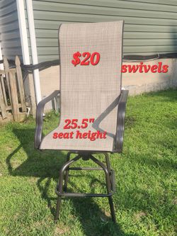 (1) Bar height swivel brown chair