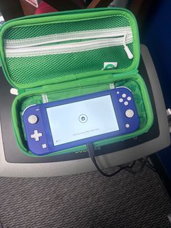 Nintendo switch lite with case and charger