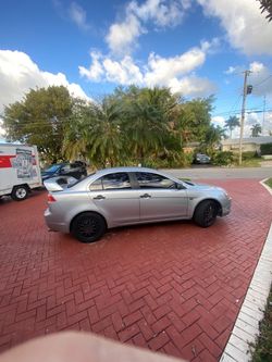 Mitsubishi Lancer Silver 4-Door Sedan