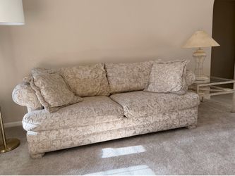 Living room, sofa, loveseat, tables, and lamps