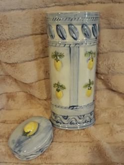 Tall oval ceramic container