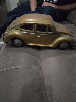 Volkswagen antique with liquor bottle